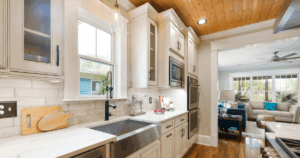 Tall kitchen cabinets in a mobile home remodel maximizing vertical storage space and enhancing kitchen organization.